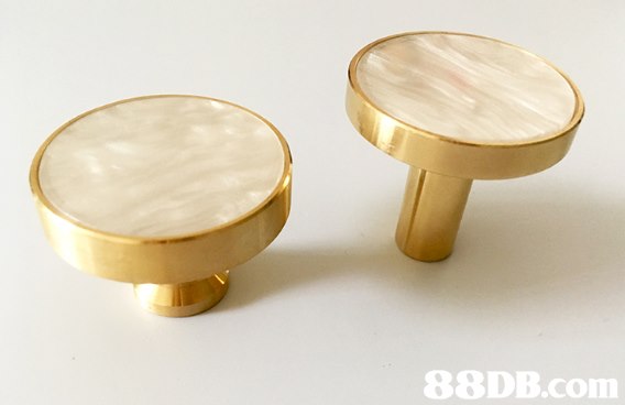brass,body jewelry,table,metal,